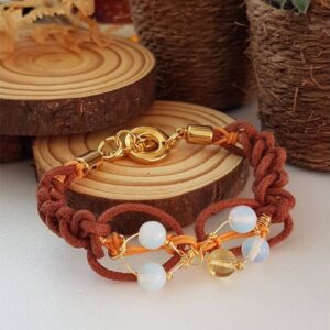 bracelete em macramê com fio de algodão, pedras da lua e âmbar